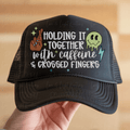 Holding It Together with Caffeine and Crossed Fingers with Melting Smiley and Brown Crossed Fingers White Font