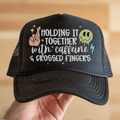Holding It Together with Caffeine and Crossed Fingers with Melting Smiley and White Crossed Fingers White Font