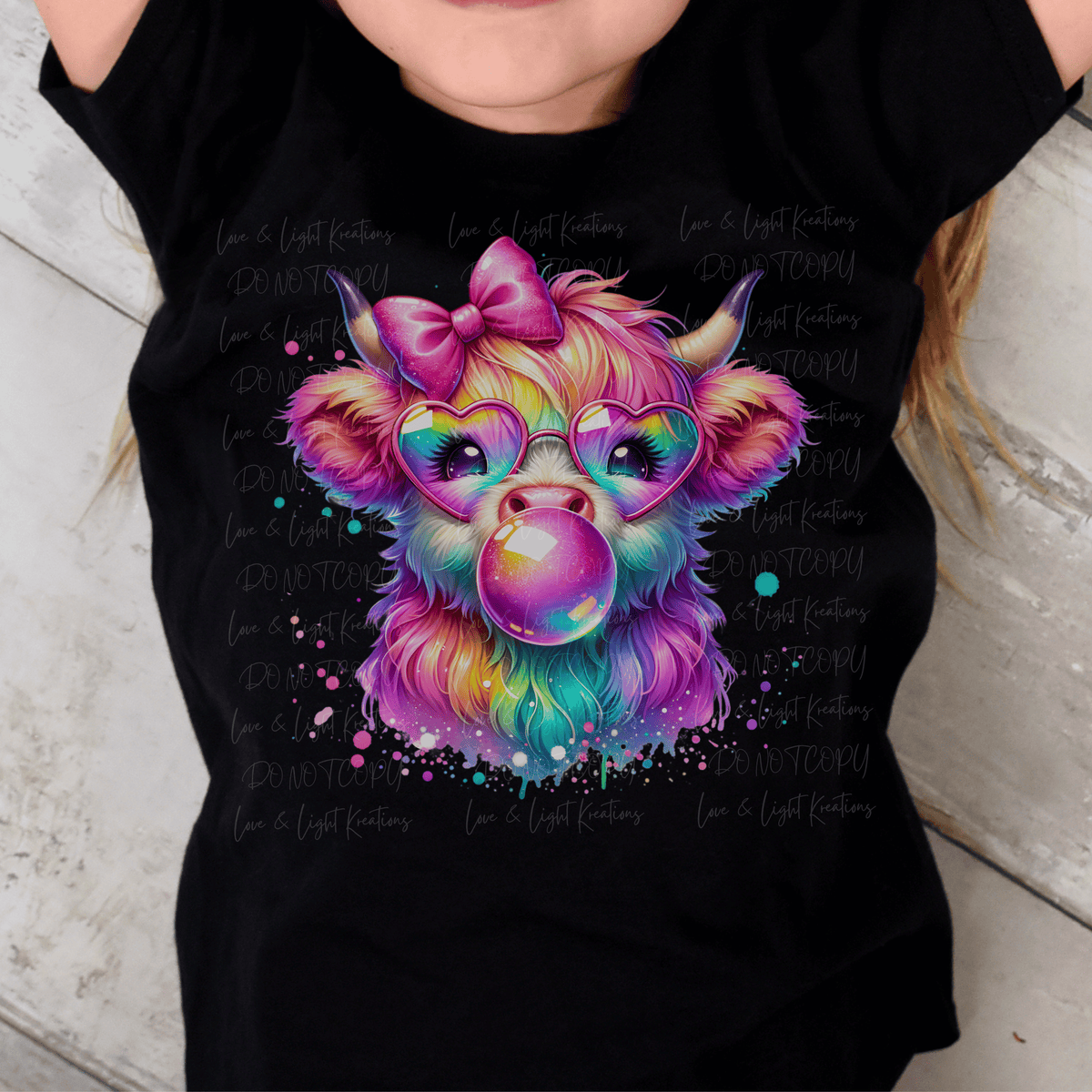 Rainbow Colored Highland Cow with a Bubble and Bow