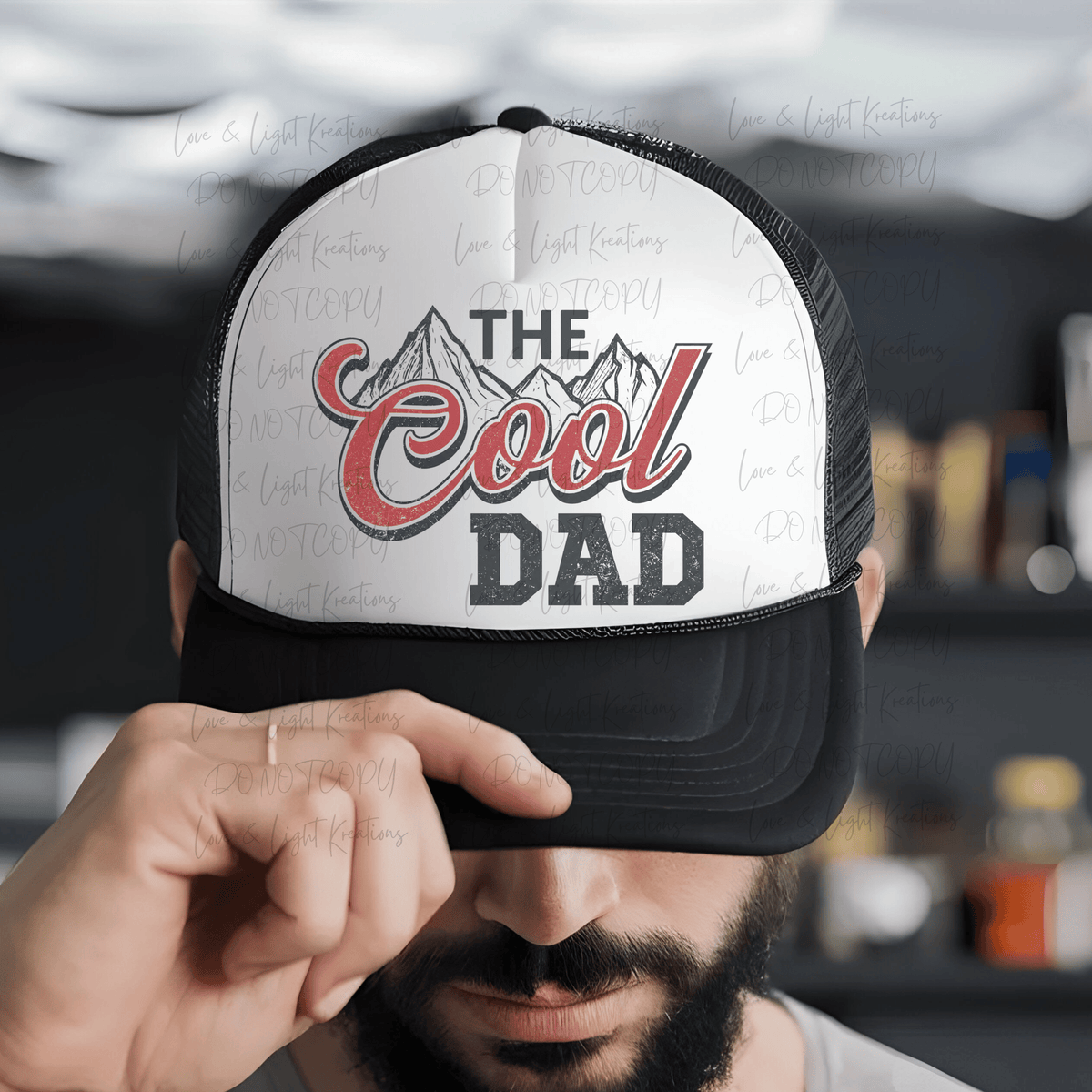 The Cool Dad with Mountains and Red Font